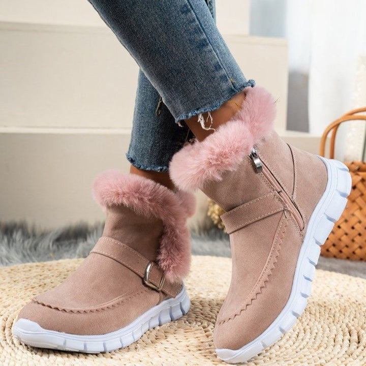 Adaline fur collar suede ankle boots in pink, side view on model