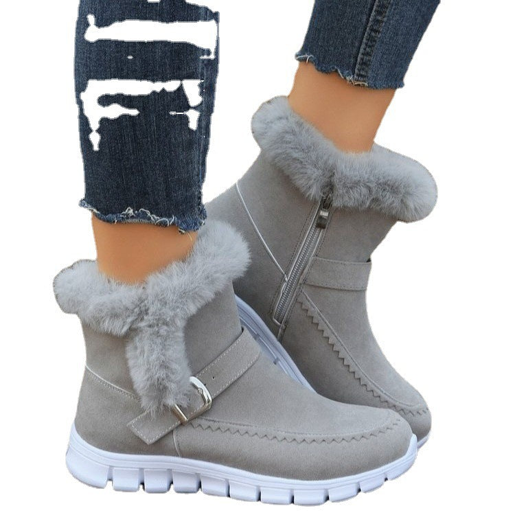 Adaline fur collar suede ankle boots in black, top-down view held in hand