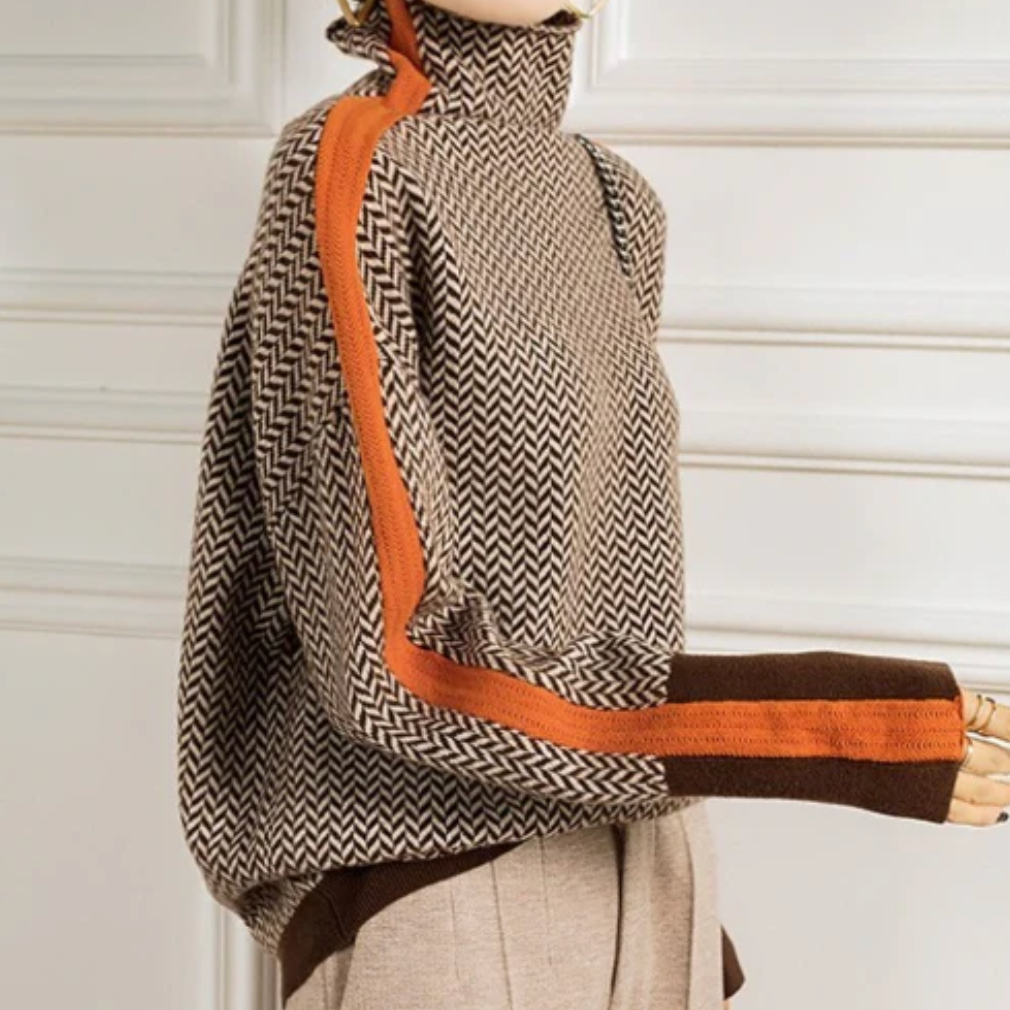 Adalyn herringbone turtleneck sweater with orange contrast trim, back view