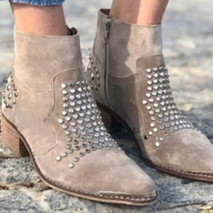Adeline studded ankle booties close-up with side zipper detail