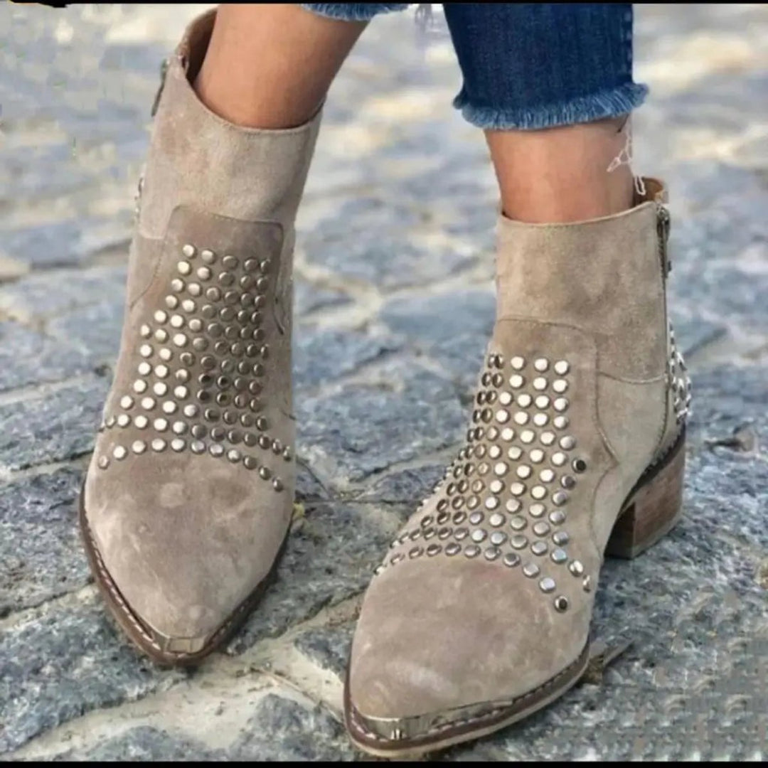 Adeline studded pointed toe booties, front view on model walking
