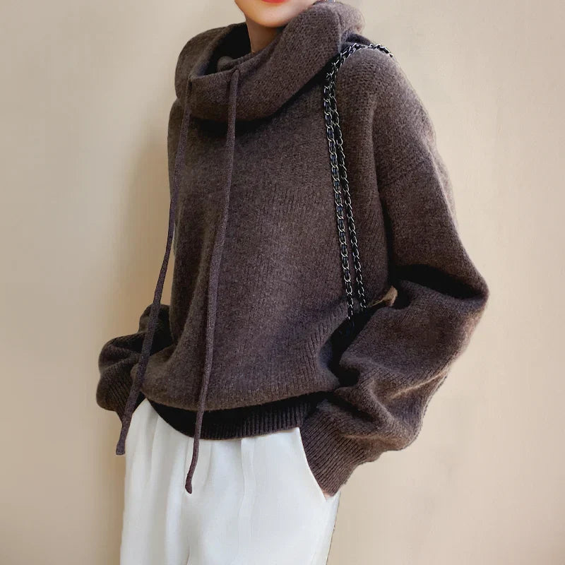 Amara oversized hooded sweater in brown, side view