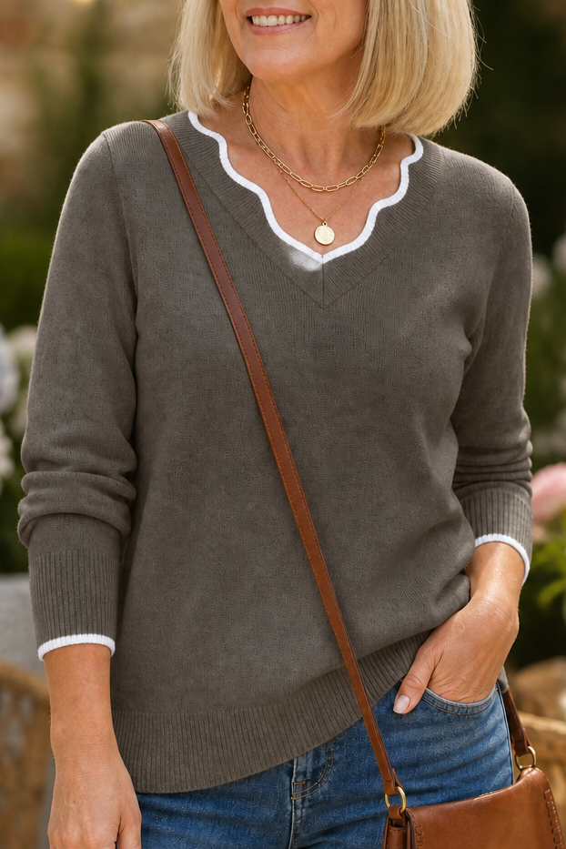 Annalise V-neck knit sweater styled with jeans and ankle boots, indoor scene