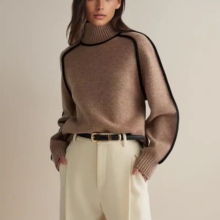 Beatrix contrast trim turtleneck fall sweater in brown, front view with belted trousers