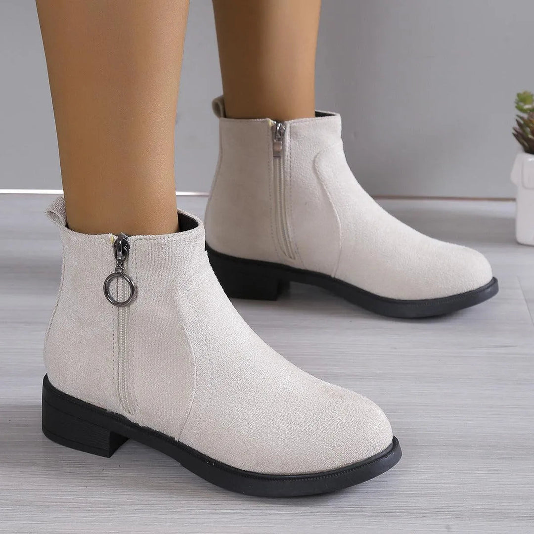 Bettina black ankle boots with chunky block heel, walking view