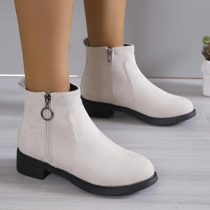 Bettina black ankle boots with chunky block heel, walking view