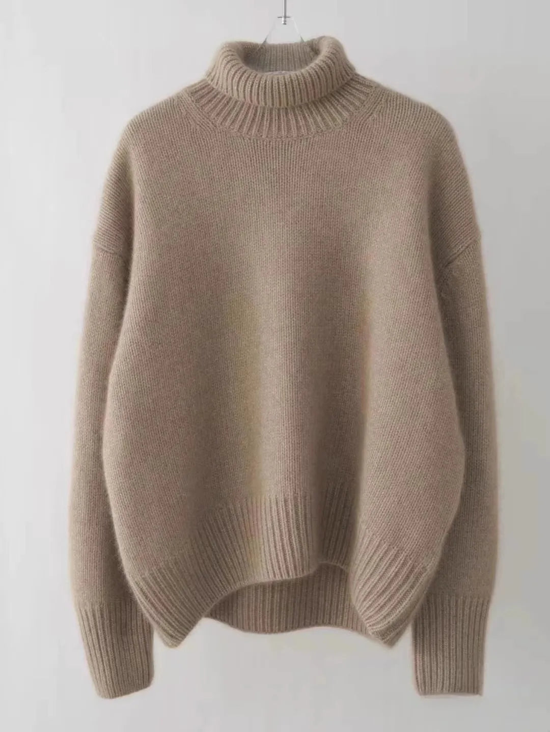 Camille turtleneck sweater on hanger, flat product view