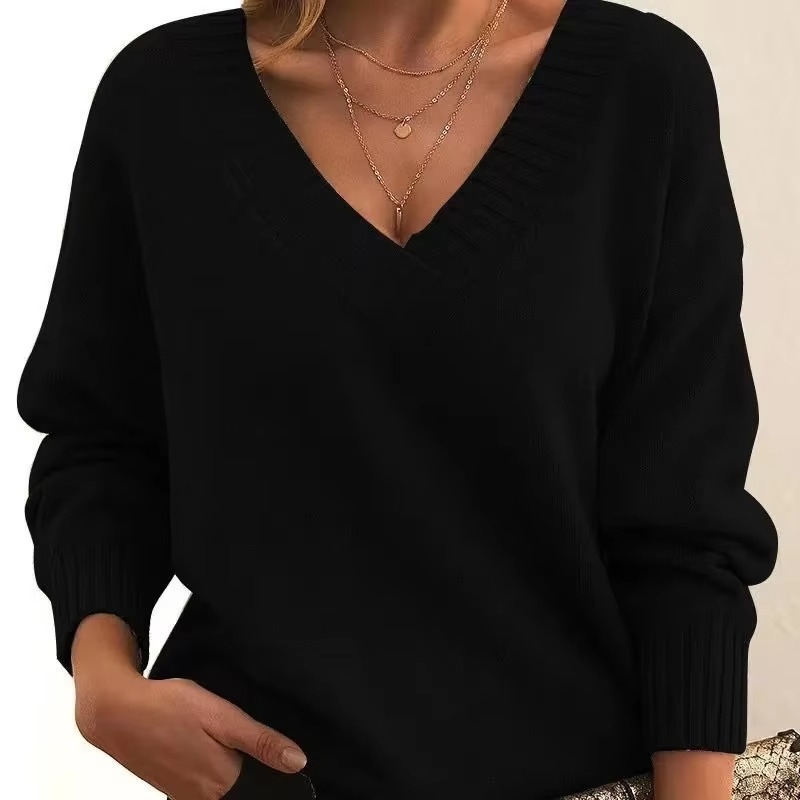 Cassandra oversized V-neck knit sweater in black, front close-up view