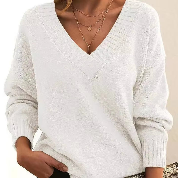 Cassandra oversized V-neck knit sweater in dusty pink, front close-up view