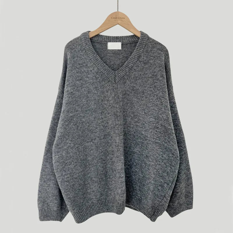 Cassandra V-neck ribbed trim sweater in gray, front view on hanger