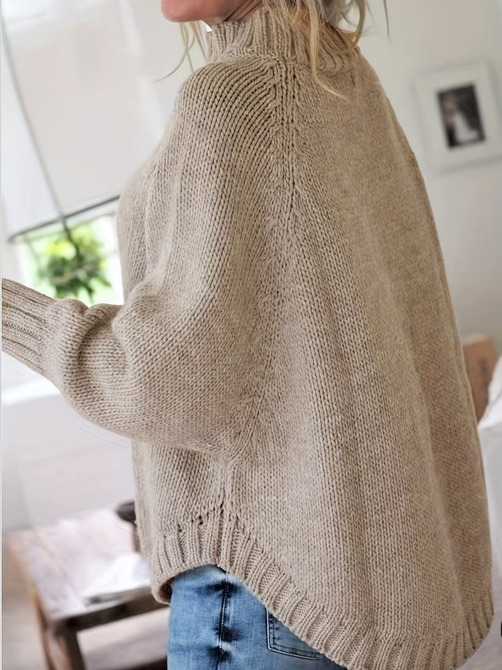 Colette oversized cable-knit sweater in khaki, side view