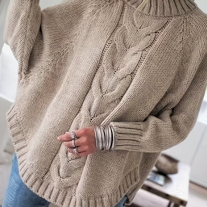 Colette oversized cable-knit sweater in khaki, back detail close up
