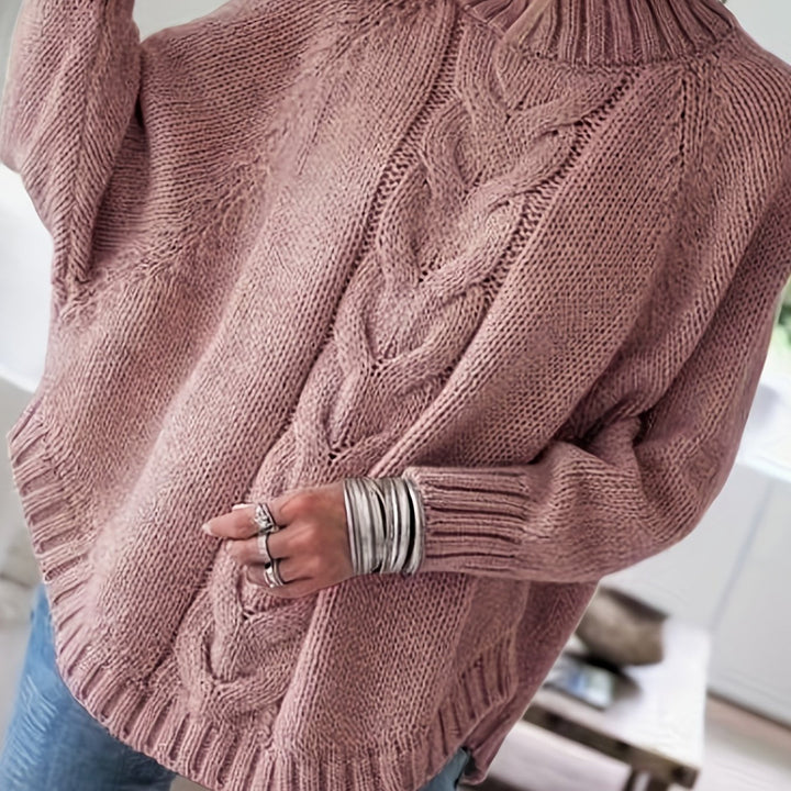 Colette oversized cable-knit sweater in pale pink, back detail close up