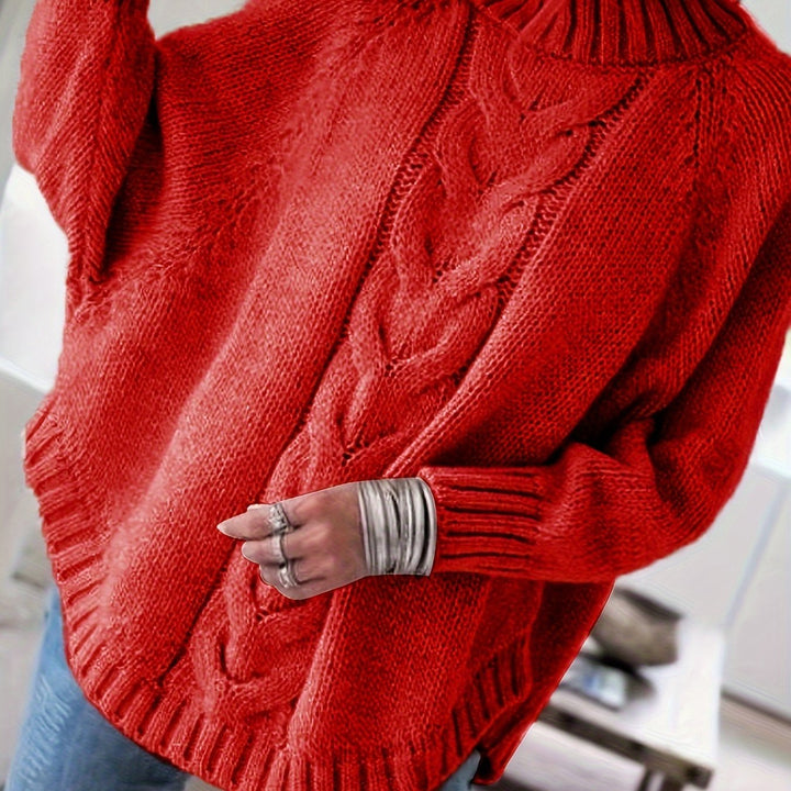 Colette oversized cable-knit sweater in red, back detail close up