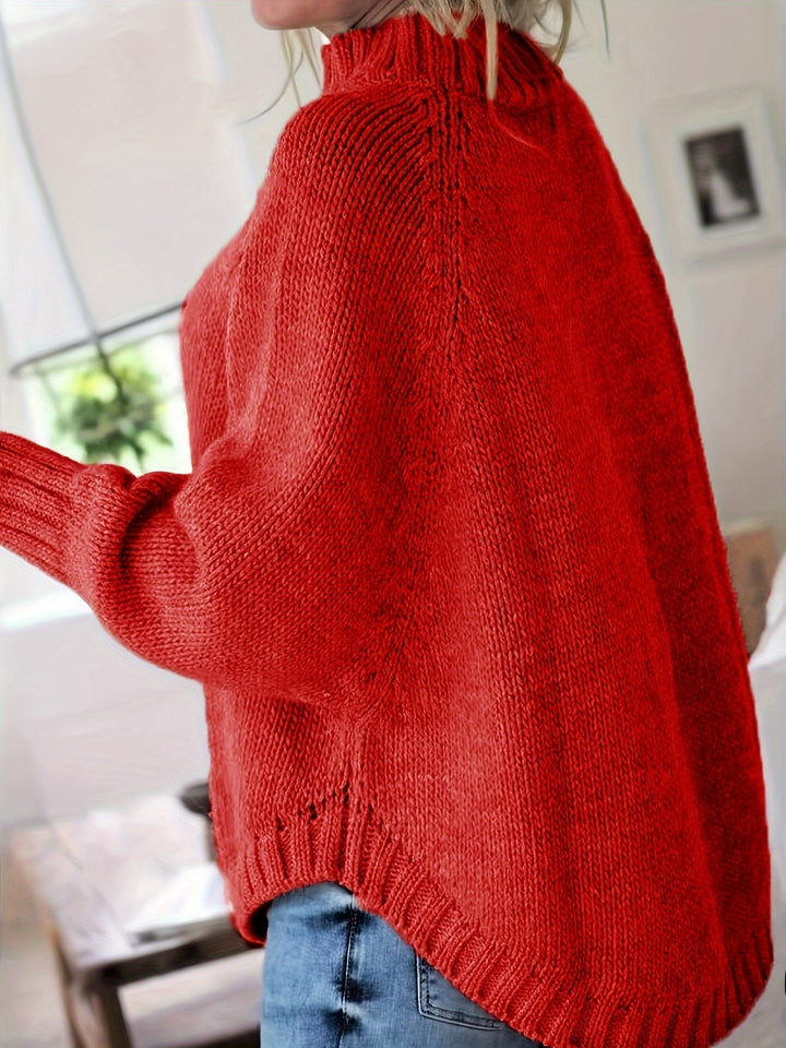 Colette oversized cable-knit sweater in red, side view