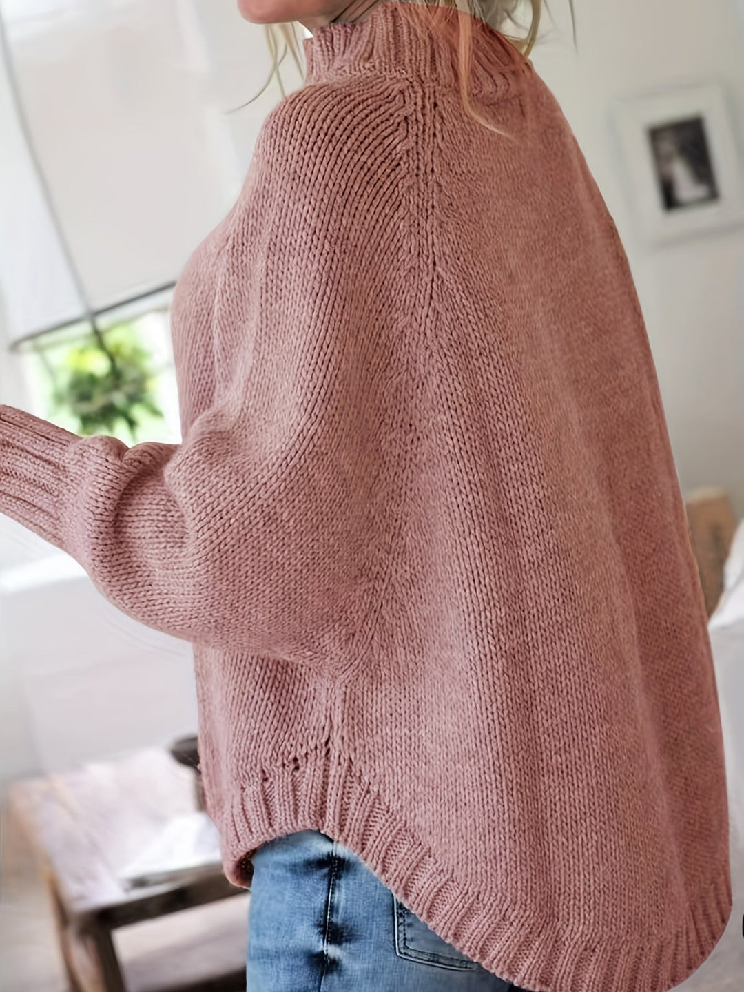 Colette oversized cable-knit sweater in pale pink, side view