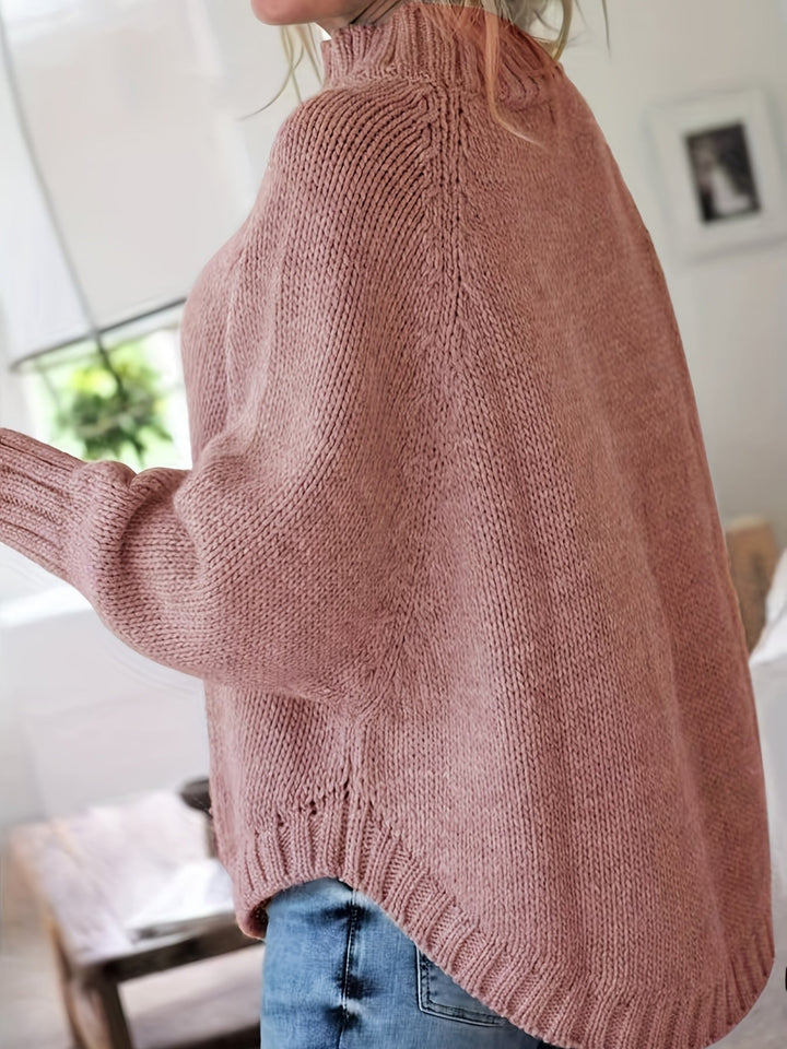 Colette oversized cable-knit sweater in pale pink, side view