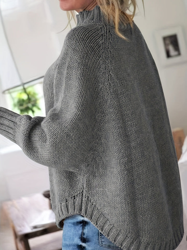 Colette oversized cable-knit sweater in gray, side view