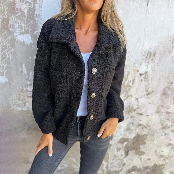 Delphine teddy coat in black, full front view on model