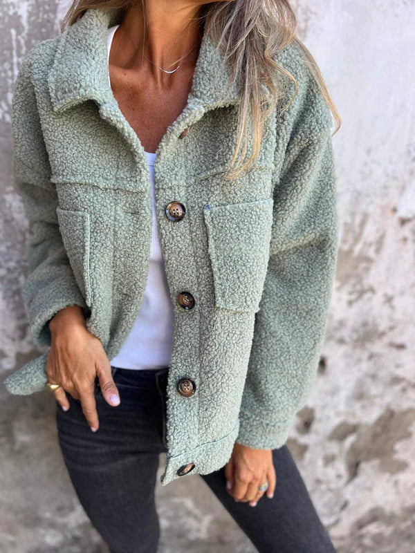 Delphine teddy coat in sage green, front view on model
