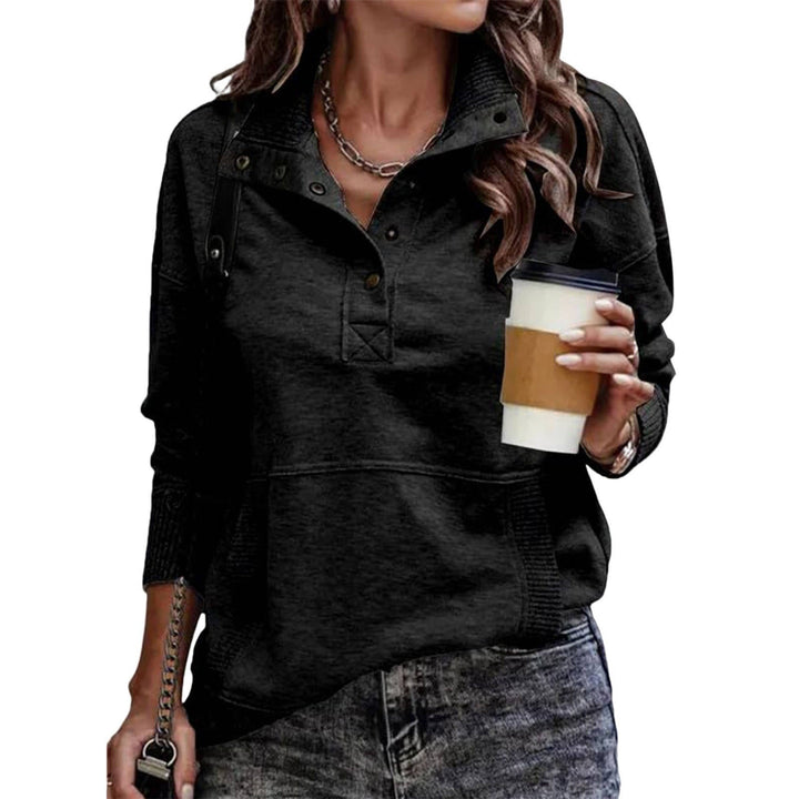Delphine black snap collar pullover sweatshirt front view with coffee cup