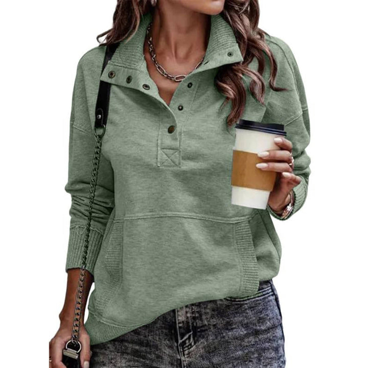 Delphine green snap collar pullover sweatshirt front view with coffee cup