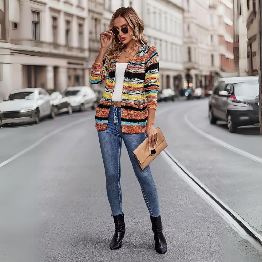 Delphine striped open front cardigan worn with jeans and sunglasses, full body street style view