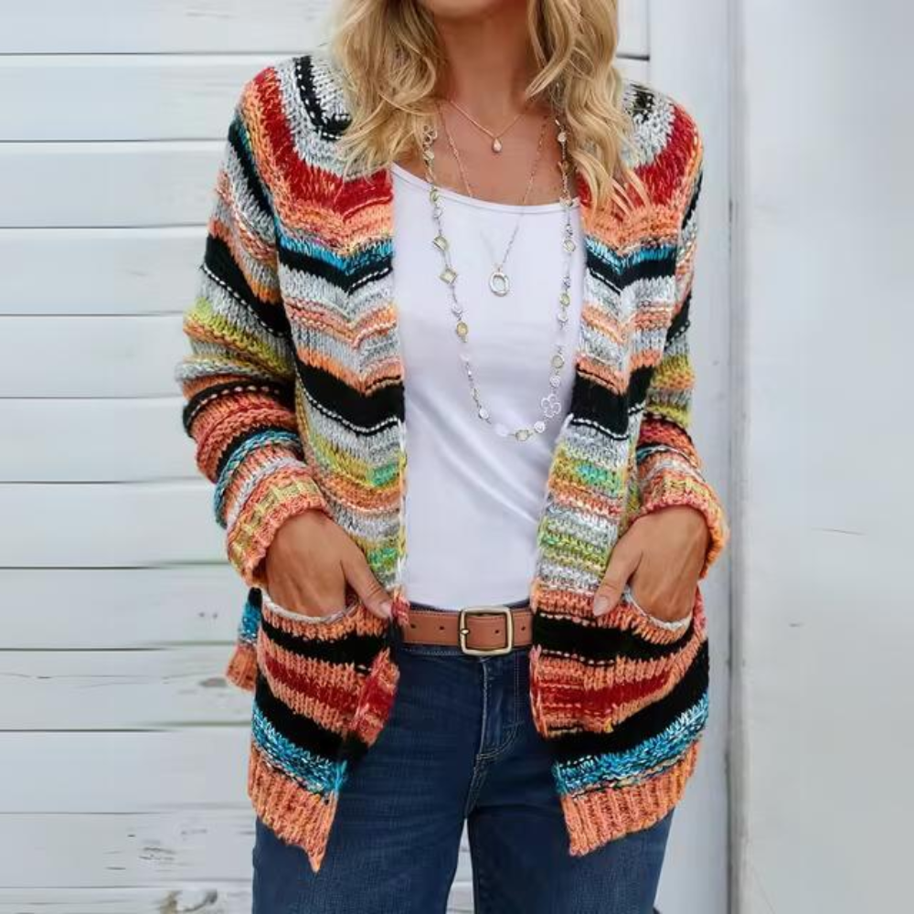 Delphine striped open front cardigan detail view with hands in pockets over jeans