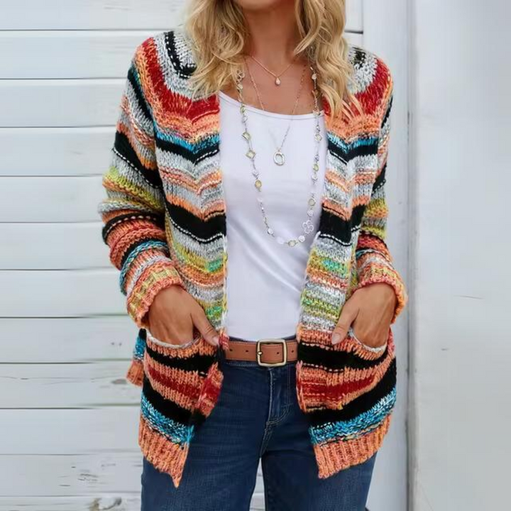 Delphine striped open front cardigan detail view with hands in pockets over jeans