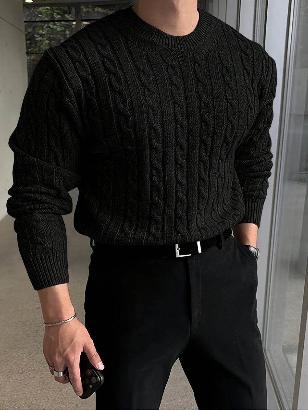 Desmond cable knit crew neck sweater in black, front view