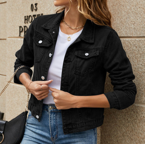 Everly black denim jacket, front view with hands at collar