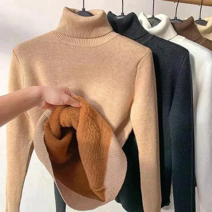Everly fleece-lined turtleneck sweater in tan, brown, black, white, and cream on hangers