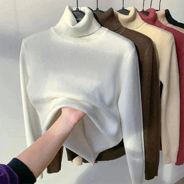 Everly turtleneck sweater in white, brown, cream, and red shown with fleece lining