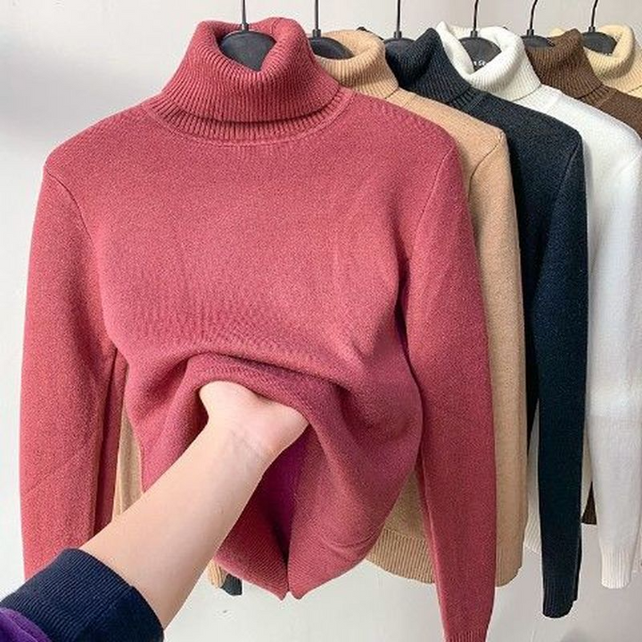 Everly turtleneck sweater in red shown with fleece lining detail