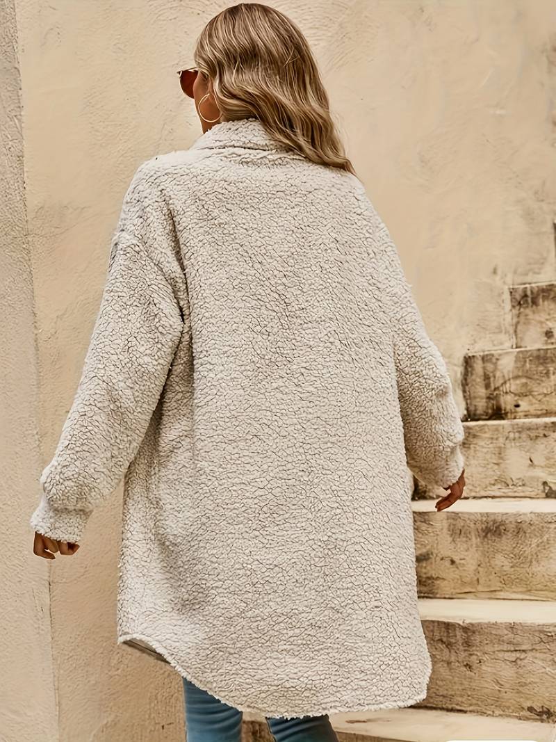 Fenwick teddy coat oversized longline back view on model walking down steps