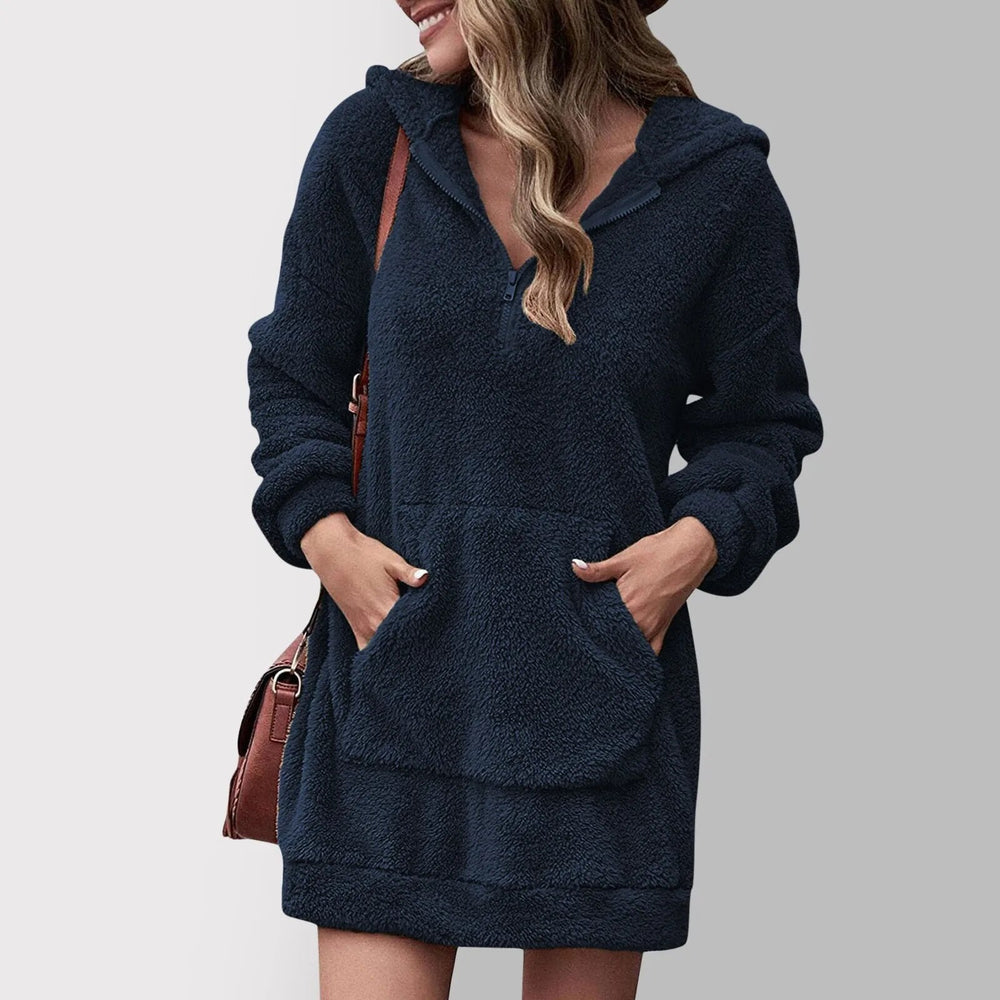 Fenwick dark blue hooded zip sweater mini dress, front view with handbag