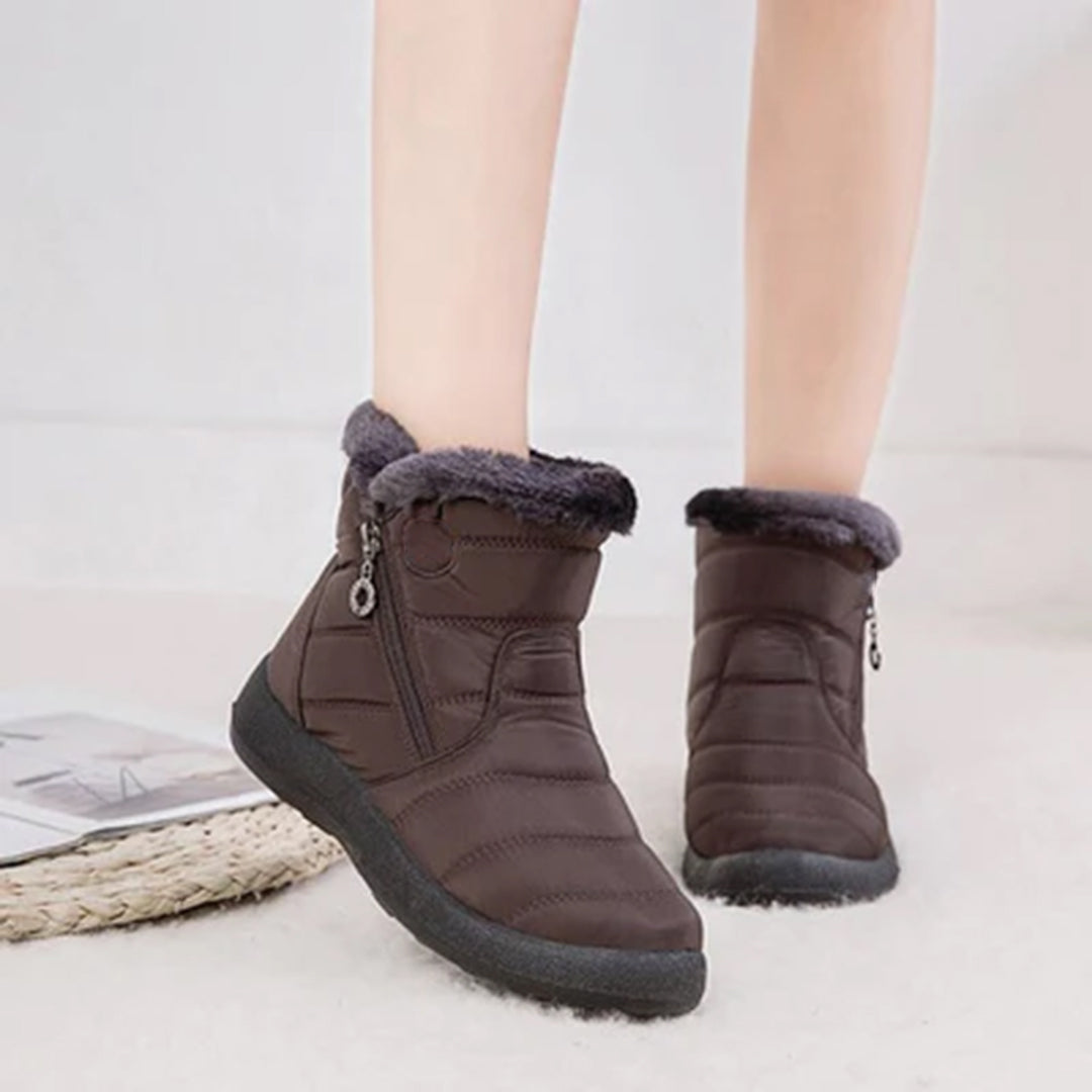 Genevieve brown snow boots worn on model, front view