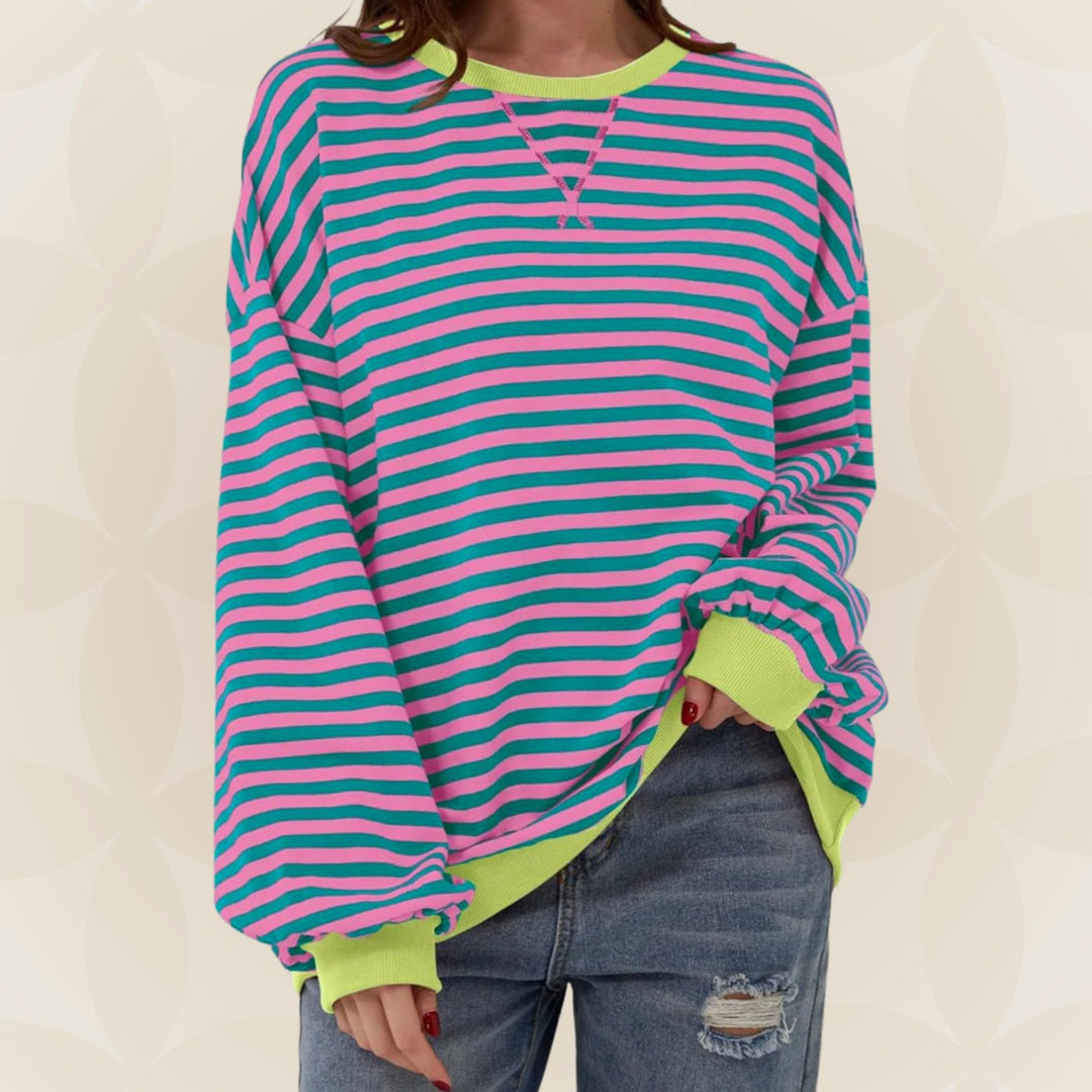 Genevieve oversized striped sweatshirt with pink and teal stripes, front view