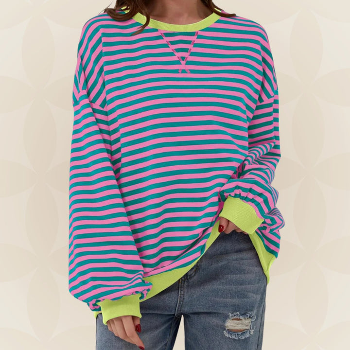 Genevieve oversized striped sweatshirt with pink and teal stripes, front view