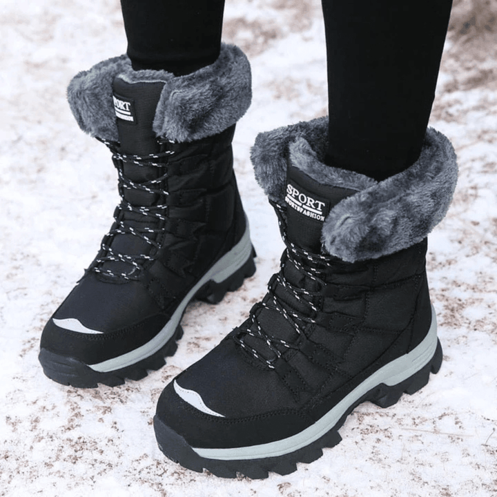 Genevieve waterproof snow boots in black with fur trim, front view