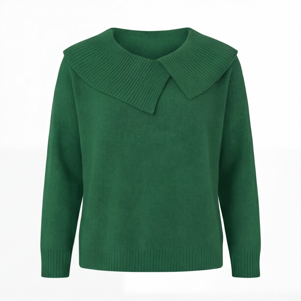 Guinevere asymmetric collar knit sweater, worn at a cafe table