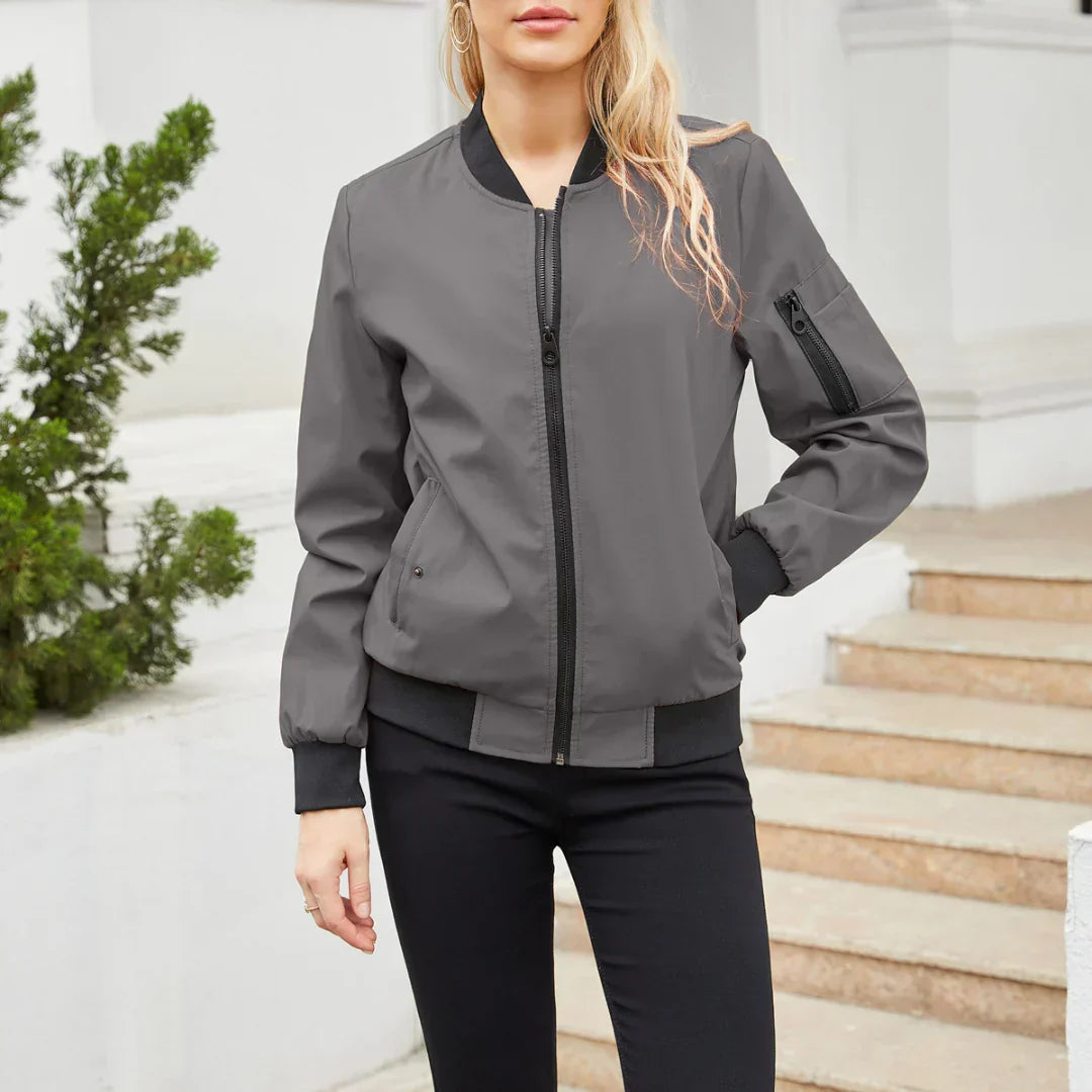 Harlow casual bomber jacket in dark gray, front view with hand in pocket