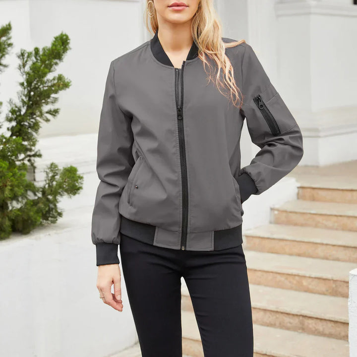 Harlow casual bomber jacket in dark gray, front view with hand in pocket