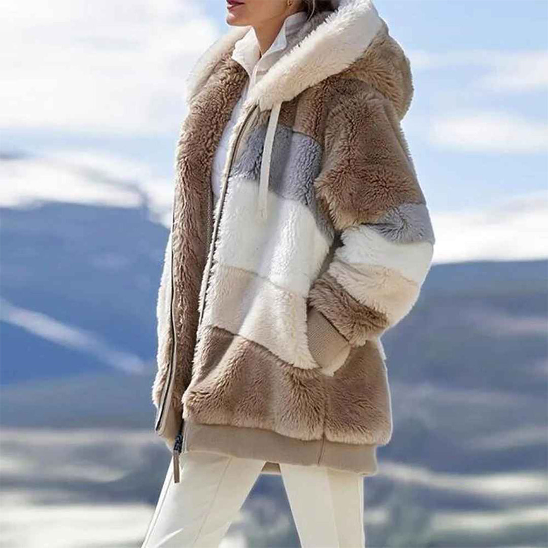 Harlow tan color block hooded fleece jacket, side view on model