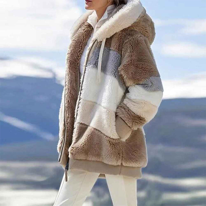 Harlow tan color block hooded fleece jacket, side view on model