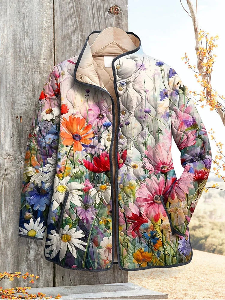 Harlow floral print quilted jacket hanging on wooden door, front view