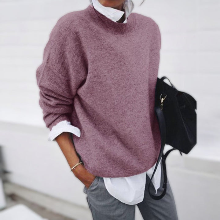 Harlow loose fit mock neck sweater in black, front view