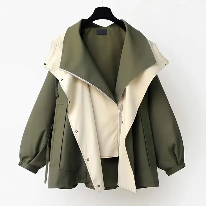 Harlow oversized hooded zip-up jacket in green and cream, front view on hanger