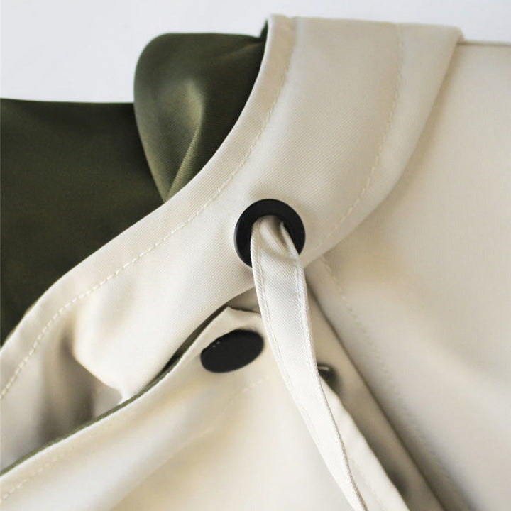 Close-up of Harlow jacket collar snap closure detail