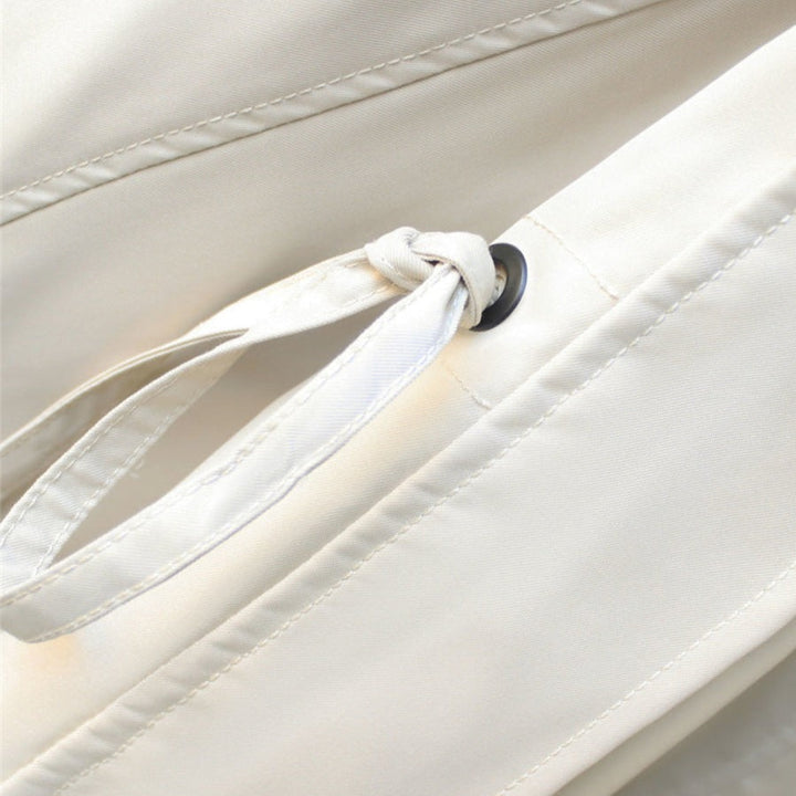 Close-up of Harlow jacket drawstring tie and grommet detail